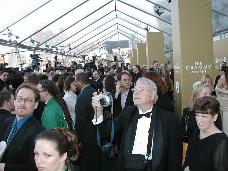 Cathy's parents making their way through the press tent.